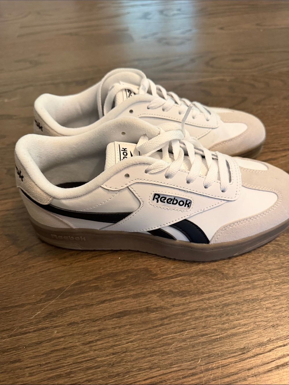 Reebok Women’s White Sneakers with Navy and Tan Sole